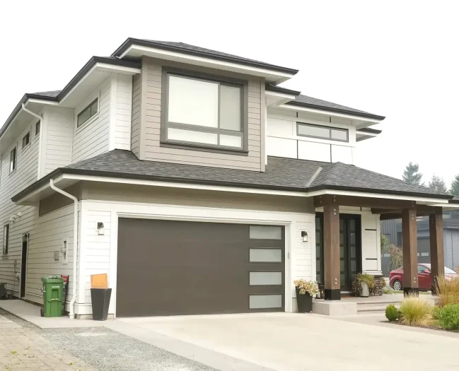 Residential property with clean windows and driveway.